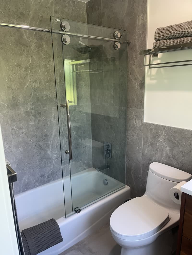 Glass shower and tub after a clean
