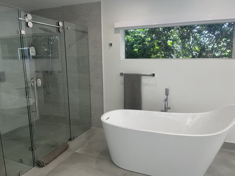Bathroom with a freestanding tub after a move-out clean