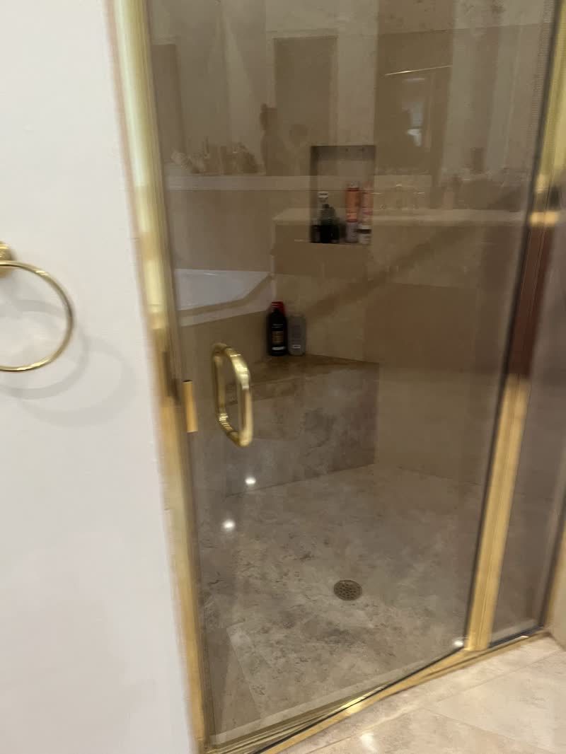 Shower with brass fittings after a clean